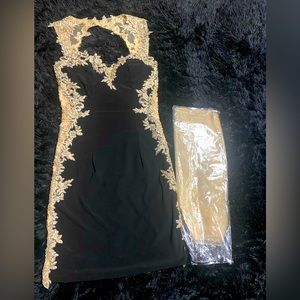 Size small black and gold dress with scarf, the scarf hasn’t been worn .